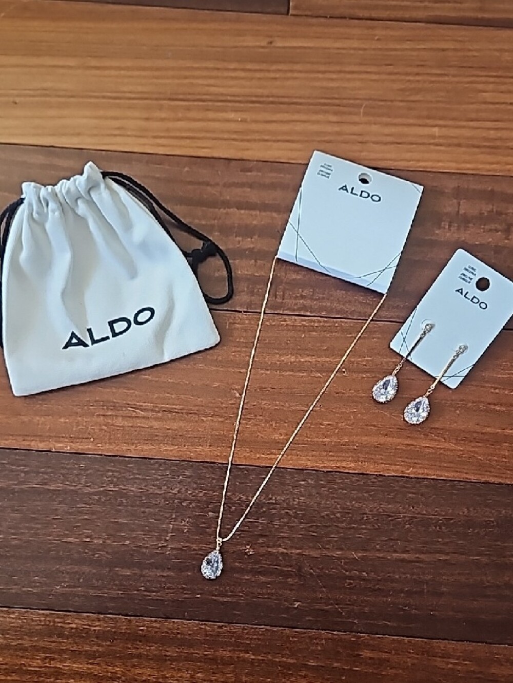 Aldo Gold Tone Necklace and Clear Teardrop Crystal Earrings Set - Picture 3 of 5